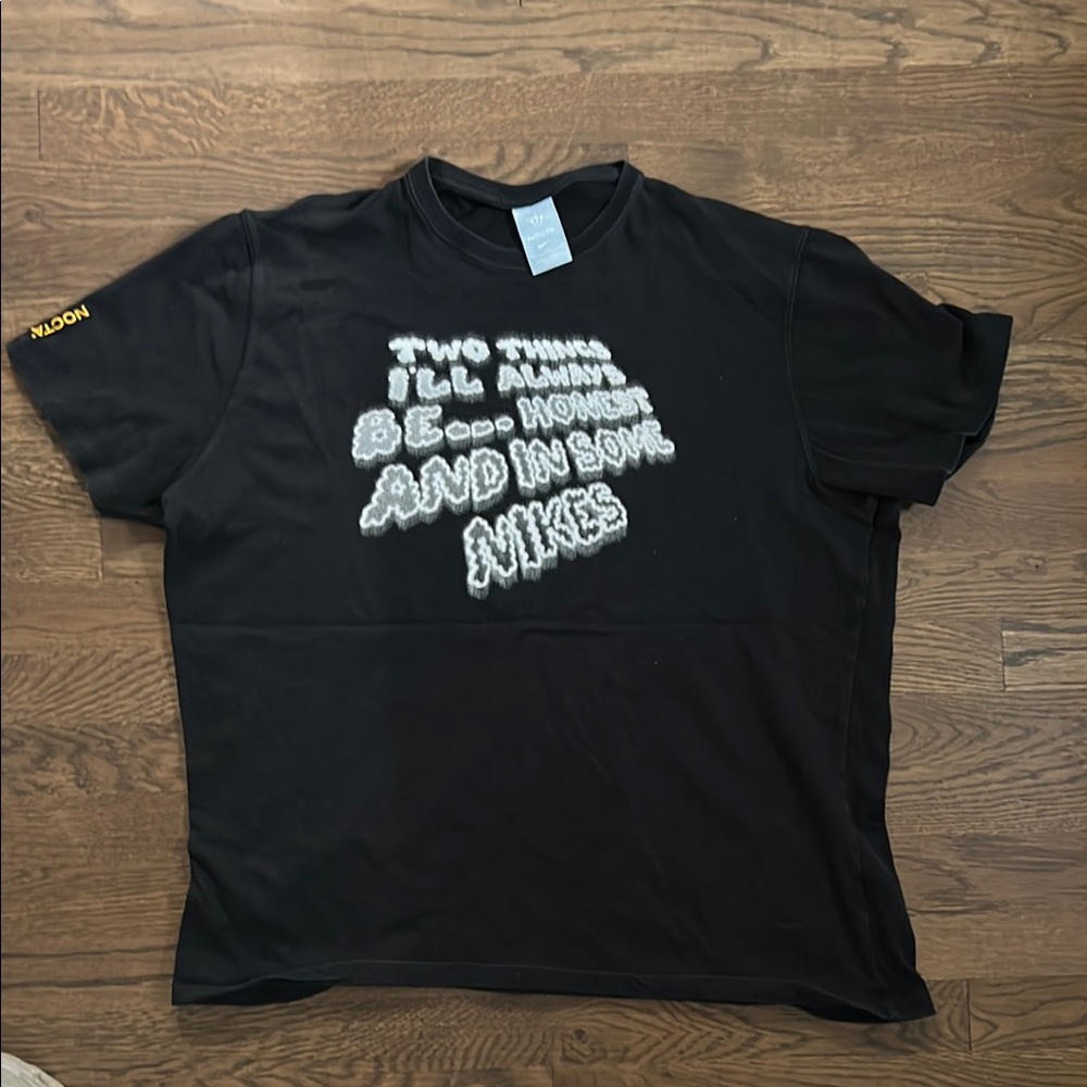 Nocta Nike Black Graphic Tee with Bold Text